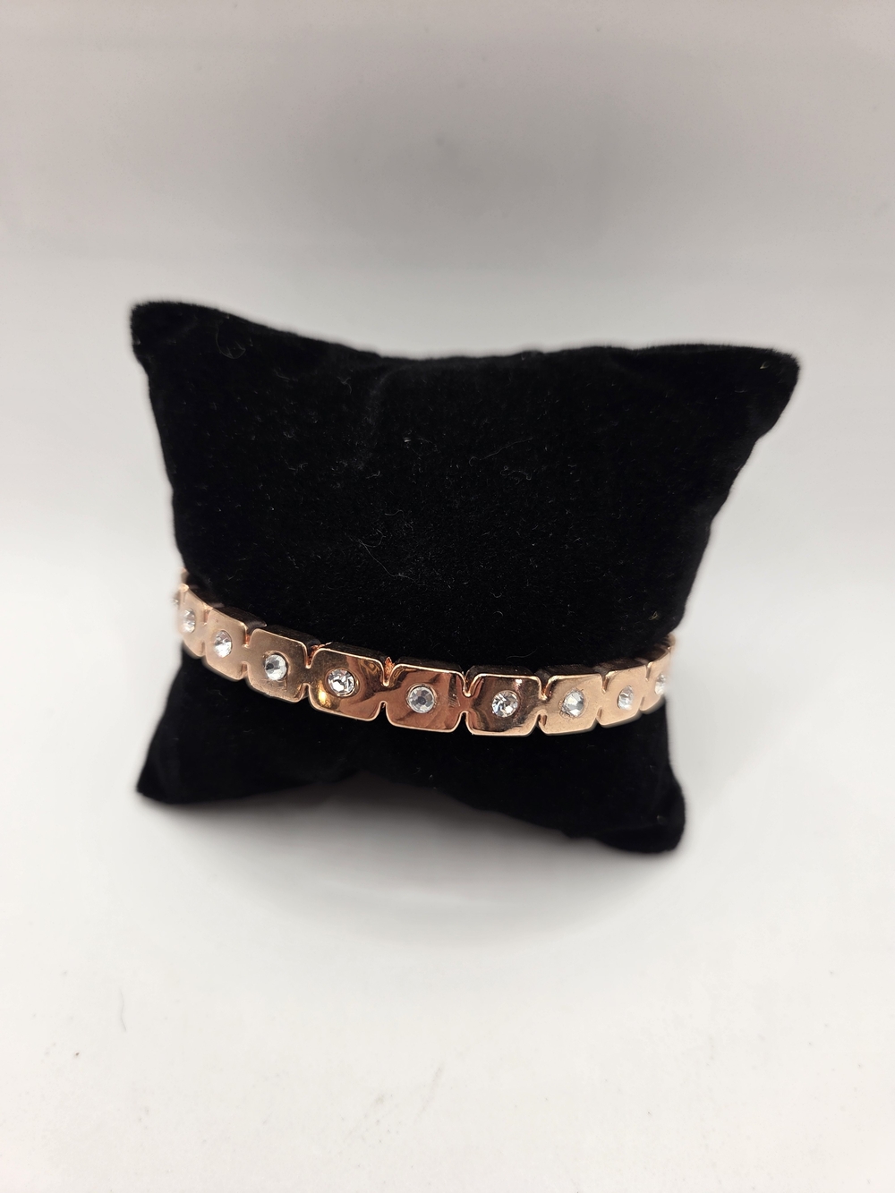1657. Rose Gold Tone Crystal Clamp Bracelet